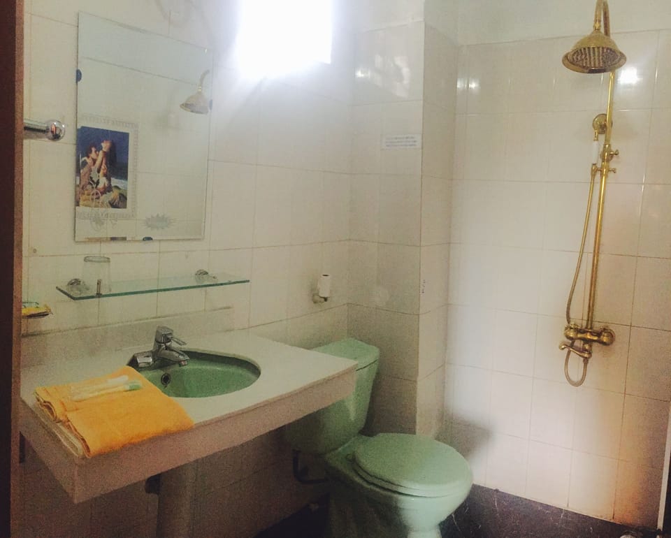 Family Room | Bathroom | Shower, free toiletries, slippers, towels