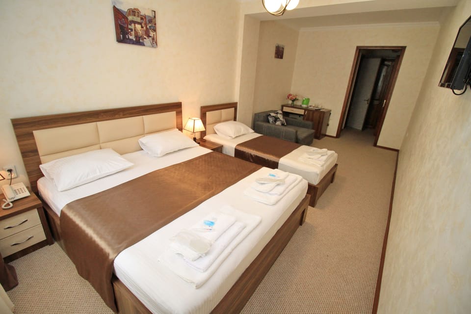 Family Triple Room, 1 Bedroom | Premium bedding, pillowtop beds, minibar, individually decorated