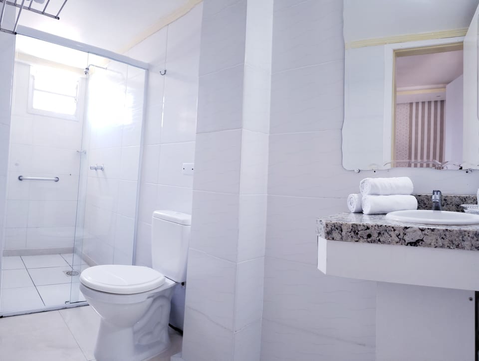 Triple Room | Bathroom | Shower, hair dryer, towels