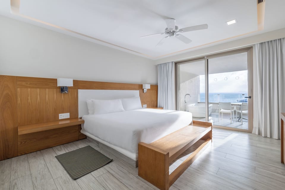 Junior Suite, 1 King Bed, Oceanfront | Premium bedding, in-room safe, soundproofing, iron/ironing board