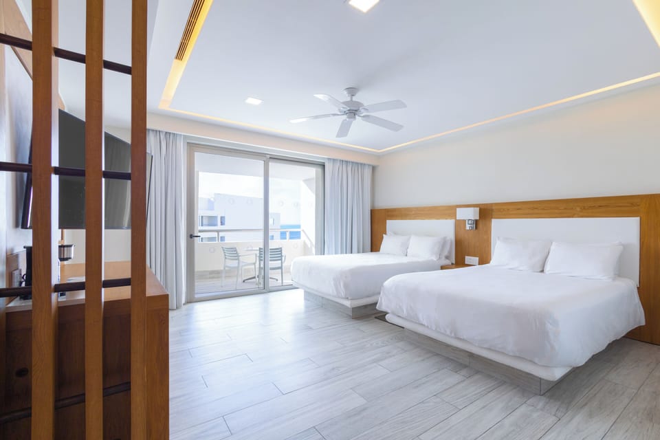 Luxury Room, 2 Double Beds, Ocean View | Premium bedding, in-room safe, soundproofing, iron/ironing board
