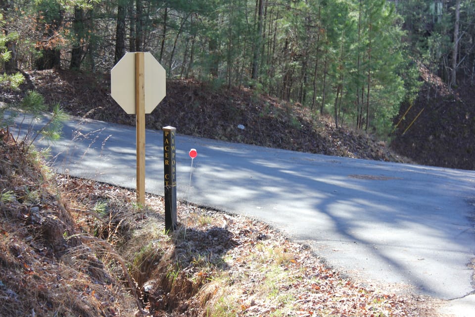 You will need to look for these somewhat hard to see signs for turning.