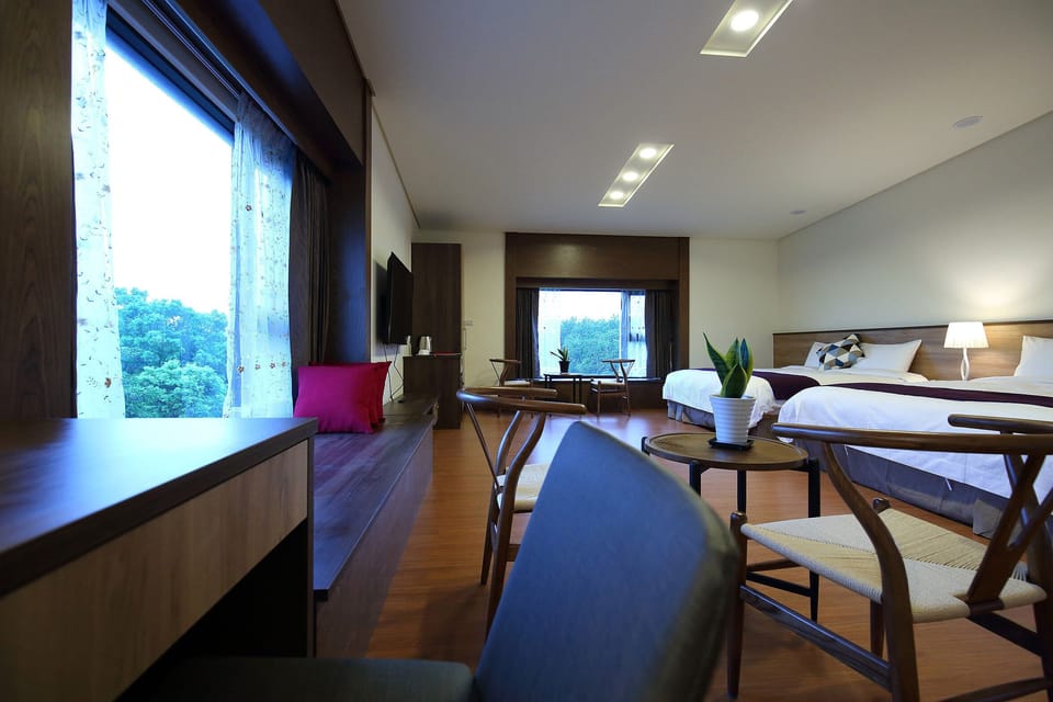 Deluxe Quadruple Room | In-room safe, desk, laptop workspace, blackout drapes