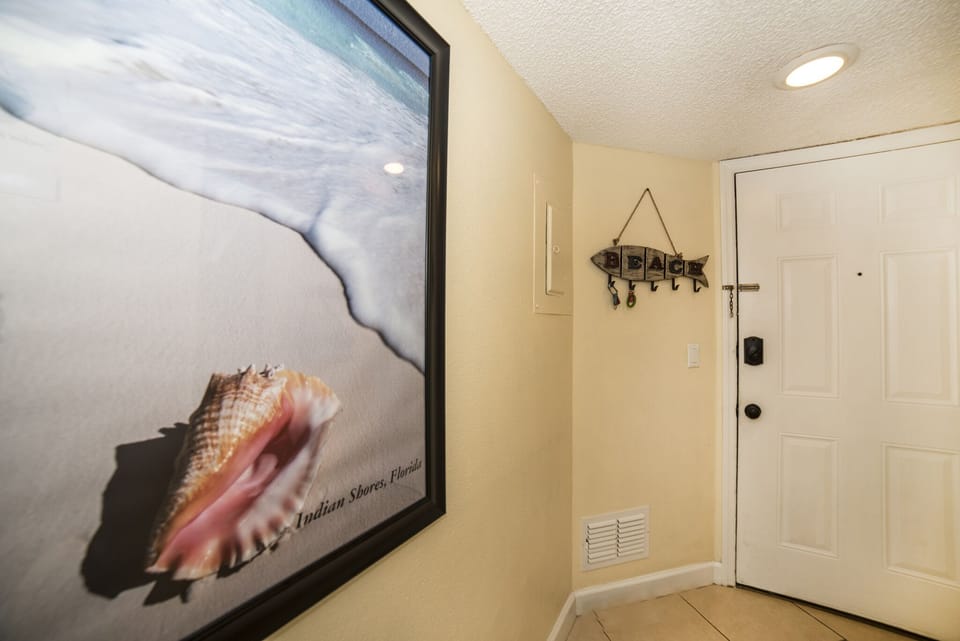 Interior of front door and hallway.