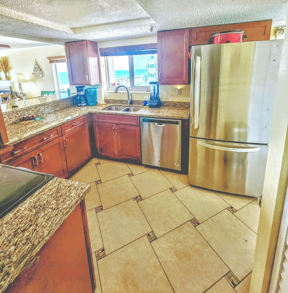 Stainless stove, dishwasher,microwave and French Door refrigerator. Crock pot.