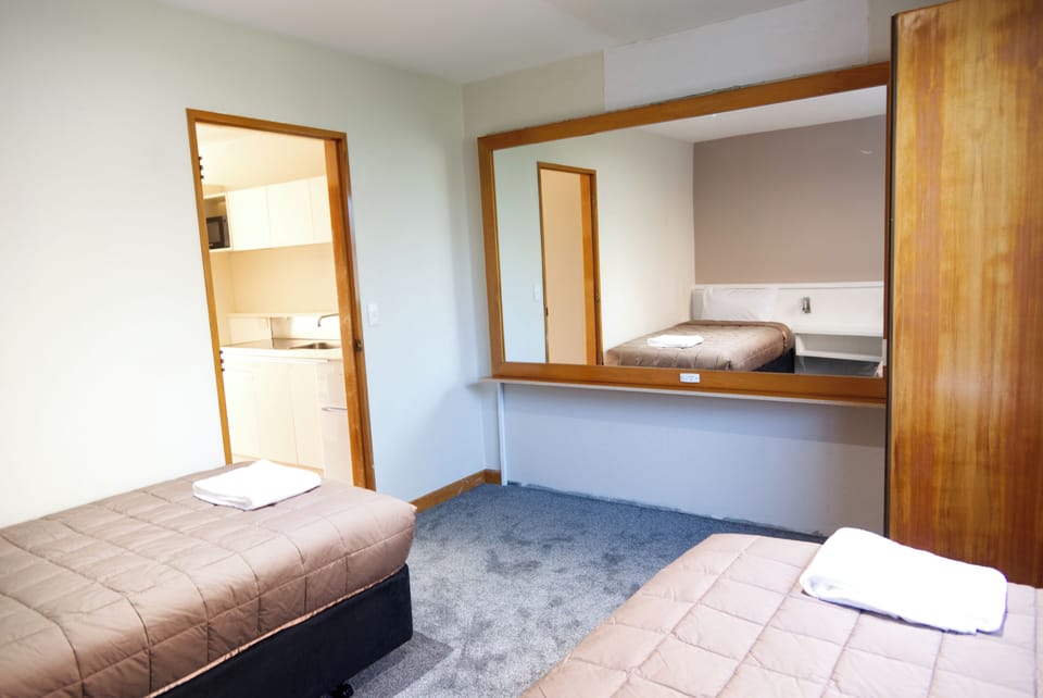Blackout drapes, iron/ironing board, free WiFi, bed sheets