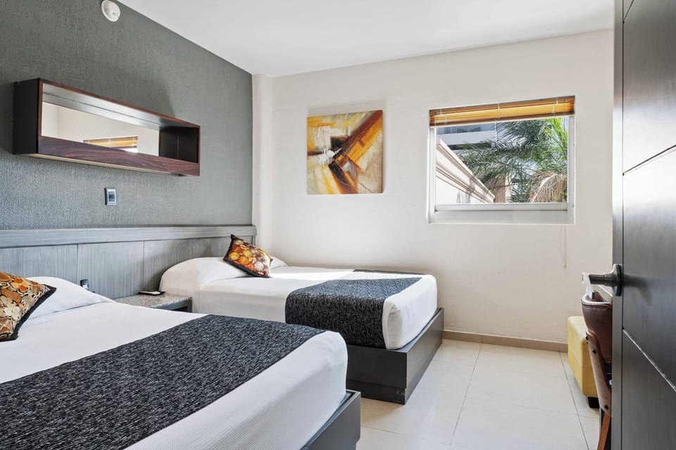 Suite, 2 Double Beds | Hypo-allergenic bedding, desk, laptop workspace, blackout drapes