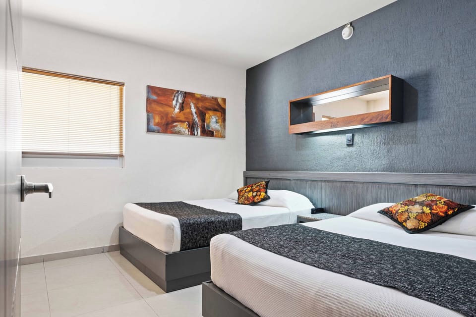Suite, 2 Double Beds | Hypo-allergenic bedding, desk, laptop workspace, blackout drapes