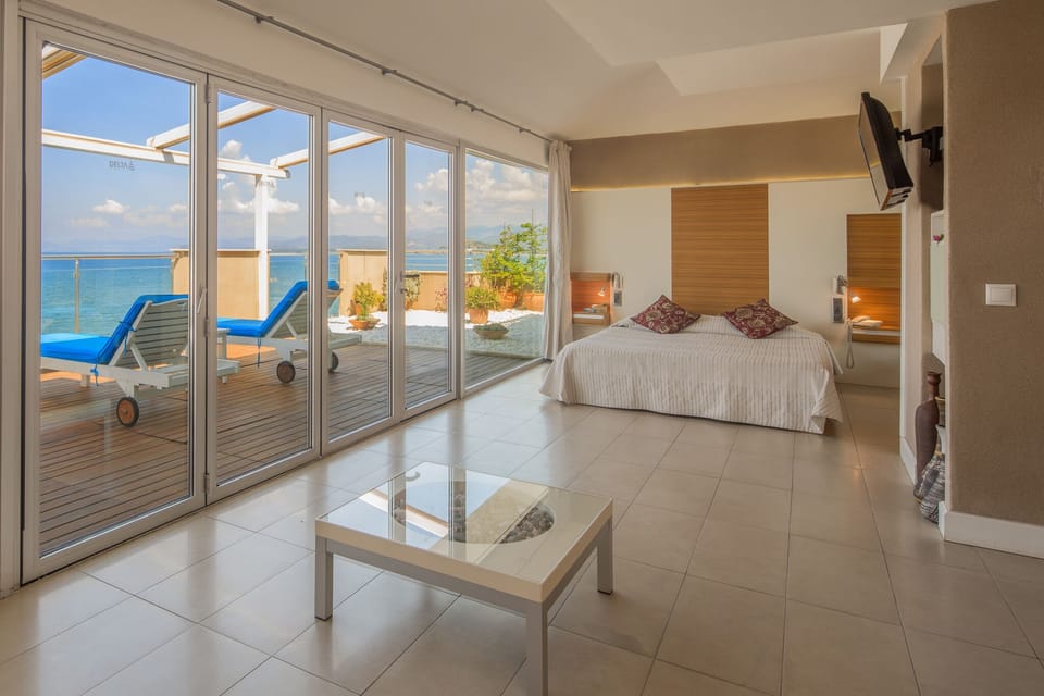 Deluxe Condo | 1 bedroom, minibar, in-room safe, iron/ironing board