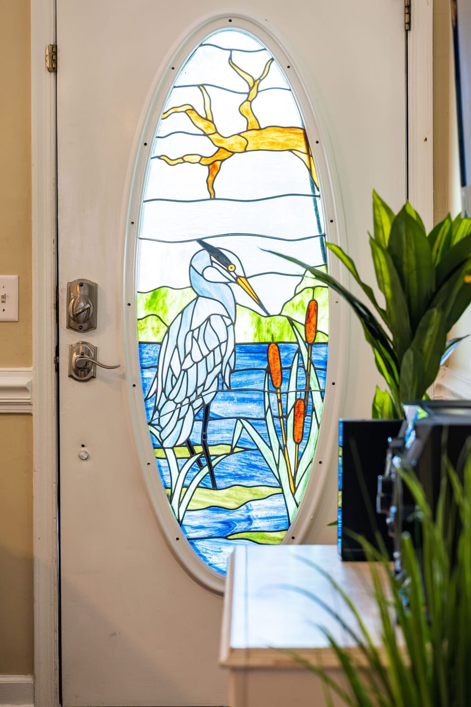 Gorgeous stained glass window custom made to reflect the wildlife in Folly Beach