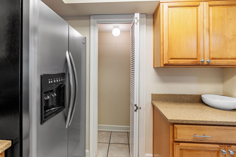 Walk in pantry-toaster, blenders, tea kettle, Keurig, pitcher, etc