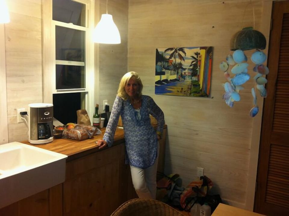 My wife Liz happy here in our island home bringing in the woman's touch. Merci