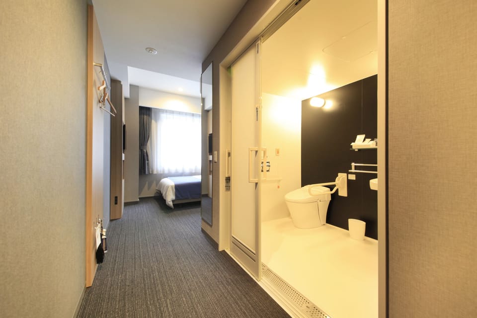 Universal Room | Desk, blackout drapes, soundproofing, iron/ironing board