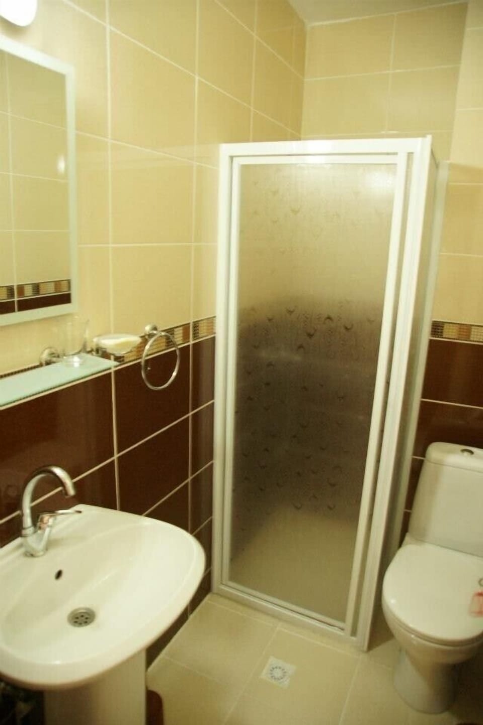 Shower, free toiletries, hair dryer, slippers