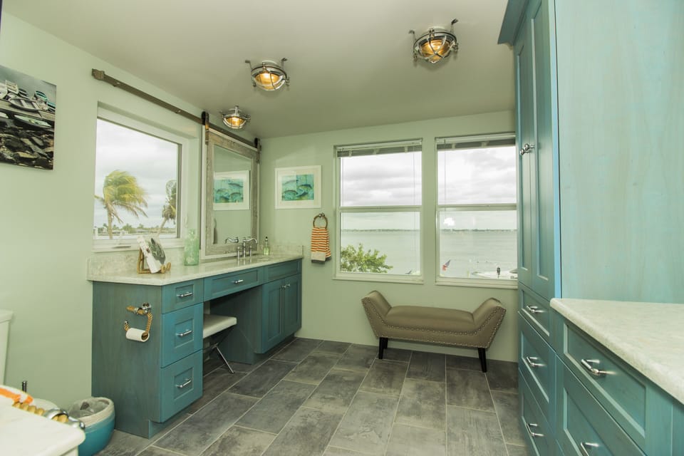 Gorgeous upstairs ensuite bathroom with two sinks and makeup area and a VIEW
