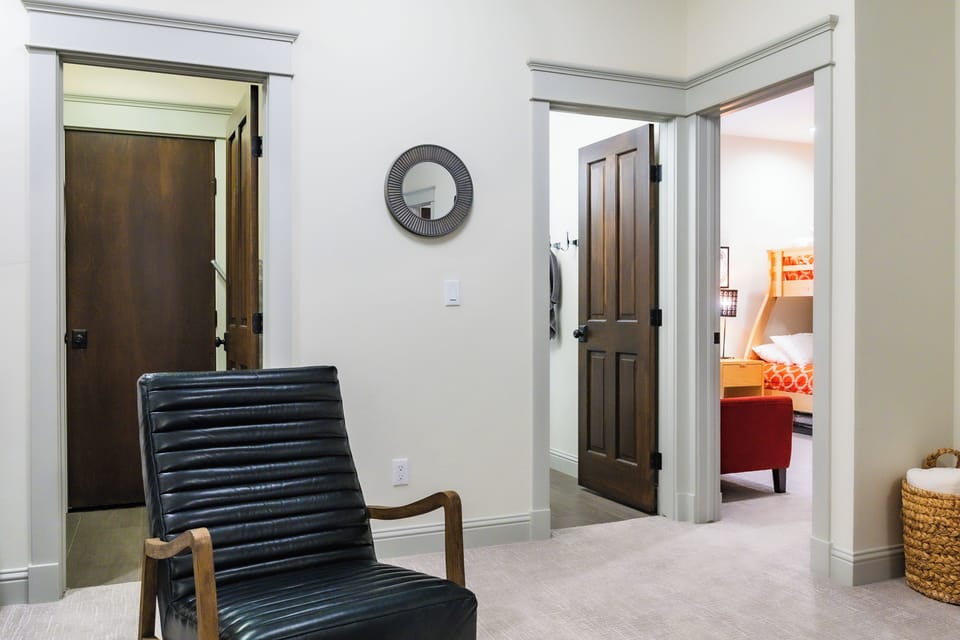 Family room and adjacent bathroom and bunk room. 