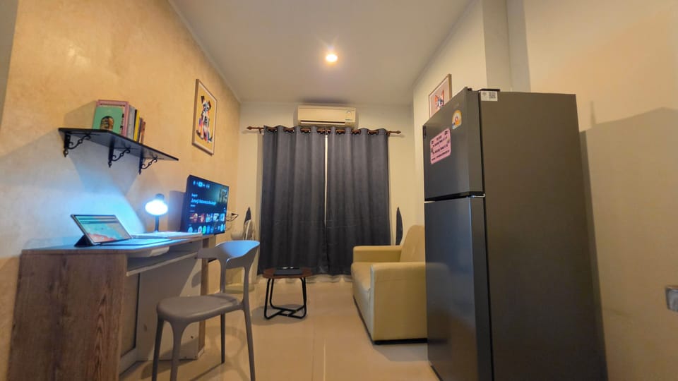 1 Bedroom Condo with Seaview | Living area | 40-inch Smart TV with satellite channels