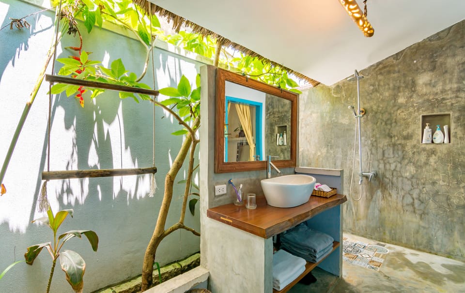 Ocean Breeze | Bathroom | Shower, free toiletries, hair dryer, slippers