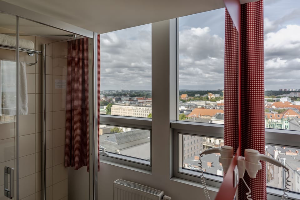 Shower, eco-friendly toiletries, hair dryer, towels