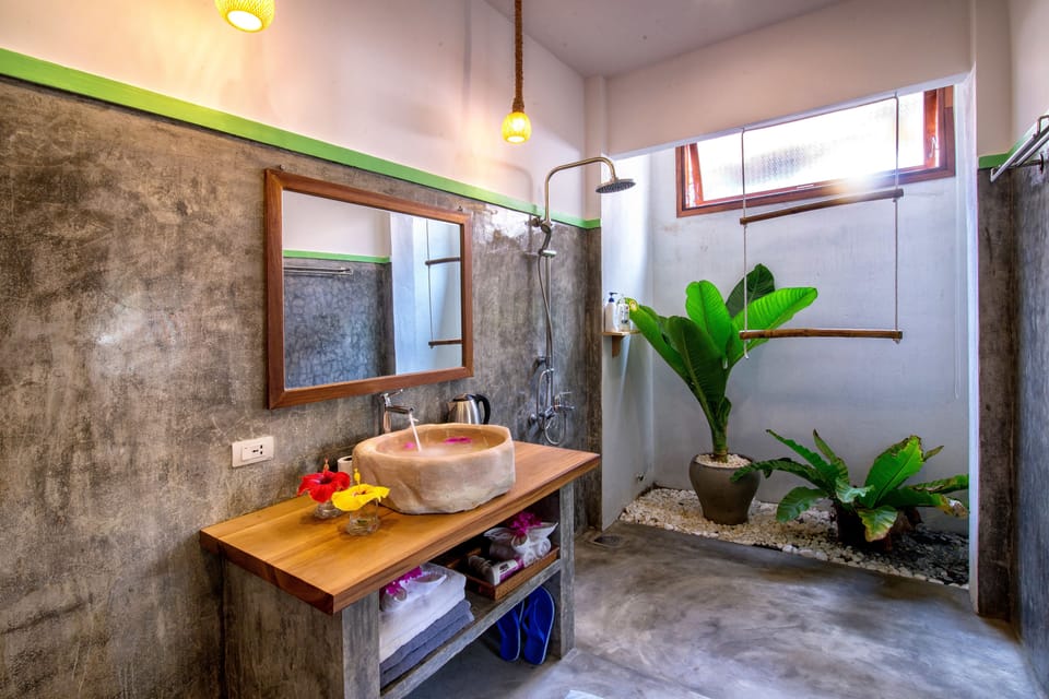 Shower, free toiletries, hair dryer, slippers