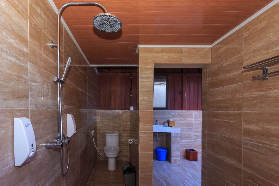 Villa, 1 Bedroom, Beachfront | Bathroom | Shower, free toiletries, hair dryer, bathrobes