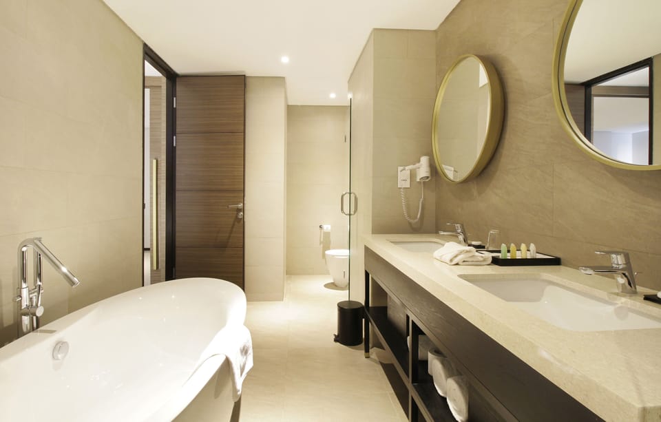 Shower, free toiletries, hair dryer, slippers