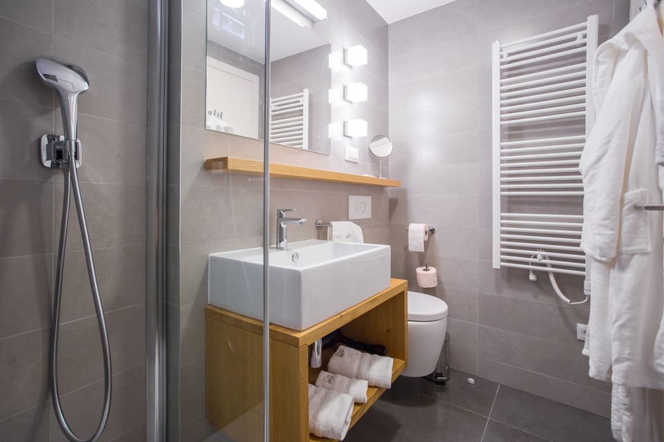 Shower, free toiletries, hair dryer, bathrobes