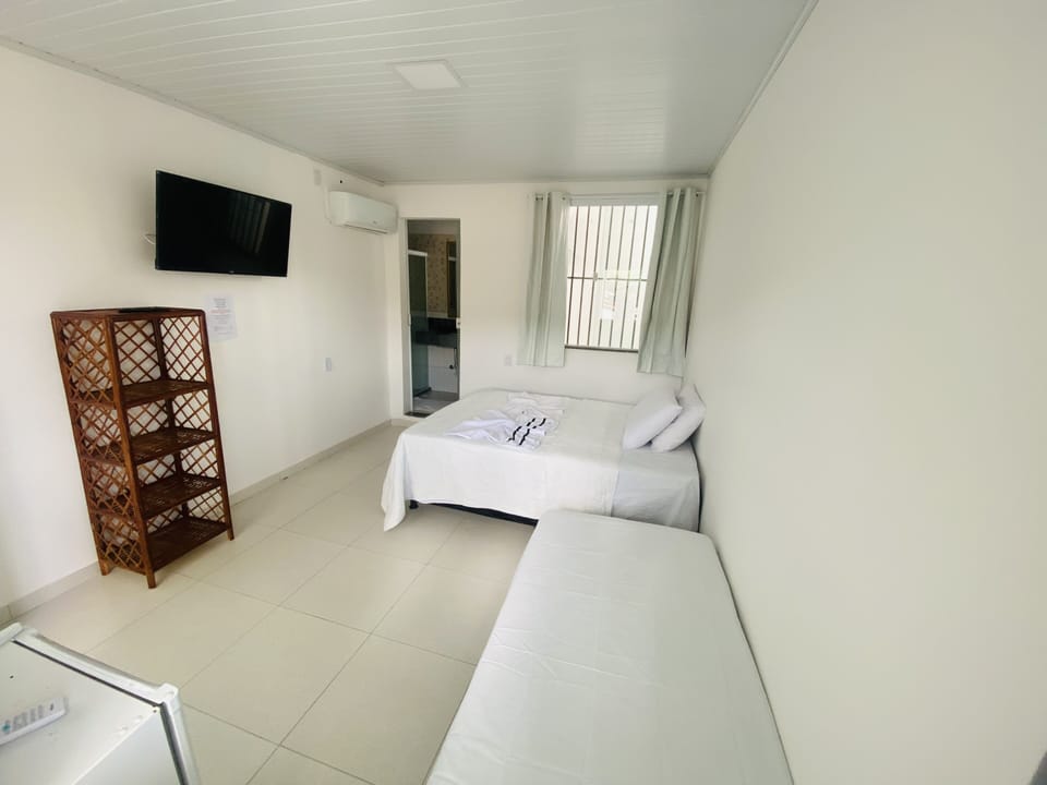 Standard Triple Room | Iron/ironing board, free WiFi