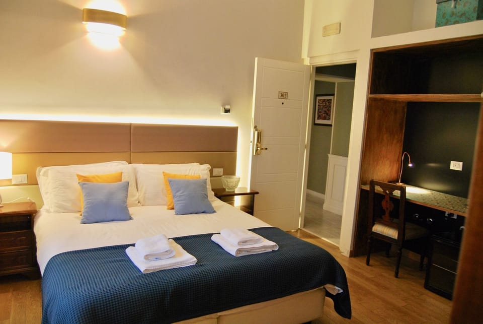 Deluxe Double Room (Queen) | Premium bedding, in-room safe, blackout drapes, iron/ironing board