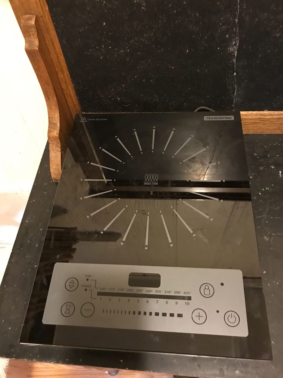 Induction cook top.  All pots and pans are included.