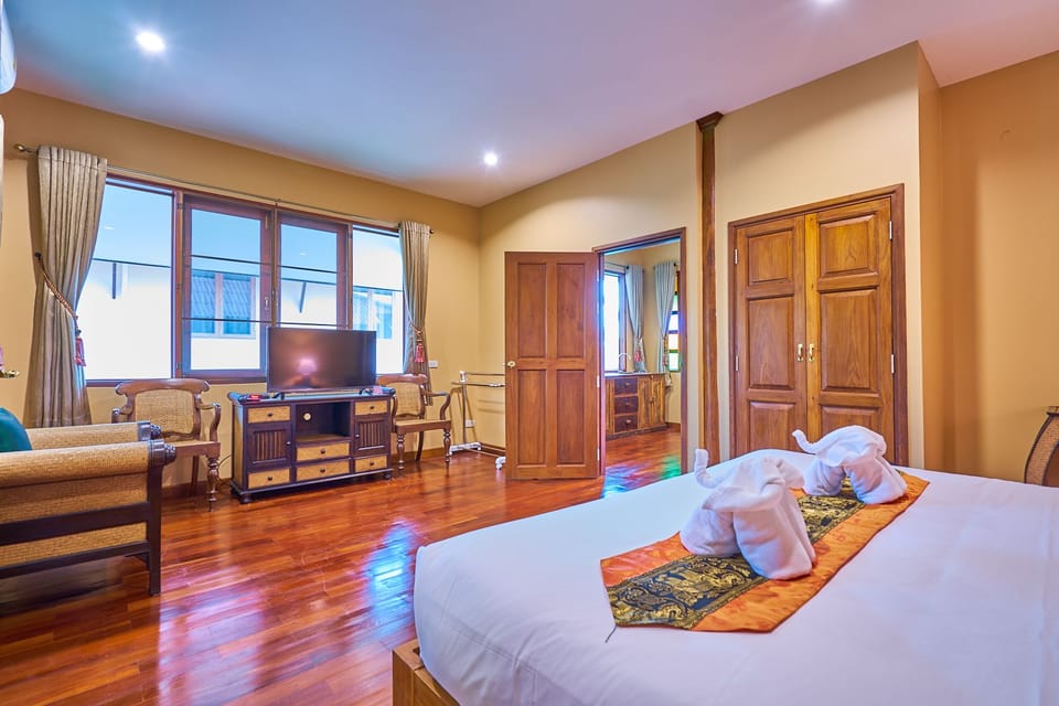Family Suite, 1 Bedroom, Pool View, Garden Area | Bathroom | Shower, free toiletries, hair dryer, bathrobes