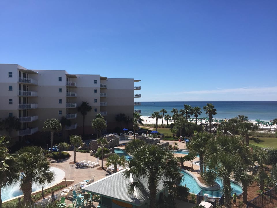 Unit B410 has excellent views of BOTH the Gulf and courtyard pool