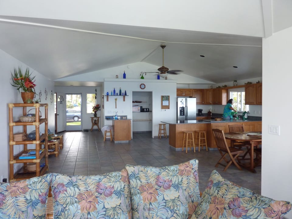 View from living room into kitchen and dining area.