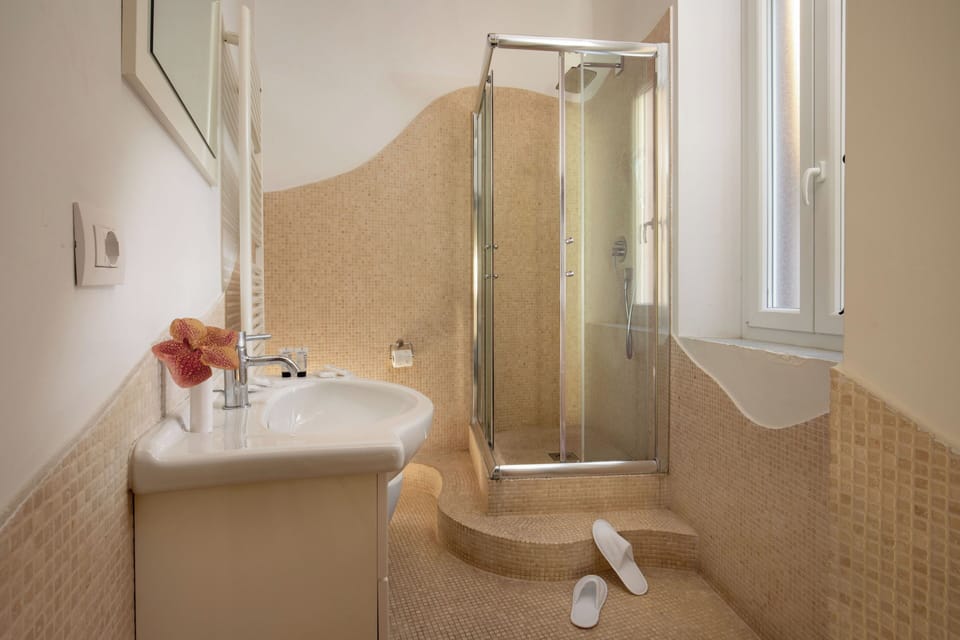 Romantic Double Room, 1 King Bed, Terrace | Bathroom | Shower, rainfall showerhead, hair dryer, bidet
