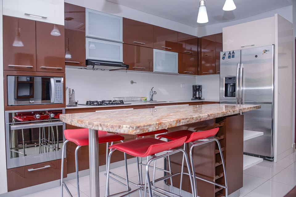 Luxury Penthouse, 3 Bedrooms, Balcony, City View | Living room | 35-inch LCD TV with cable channels, TV
