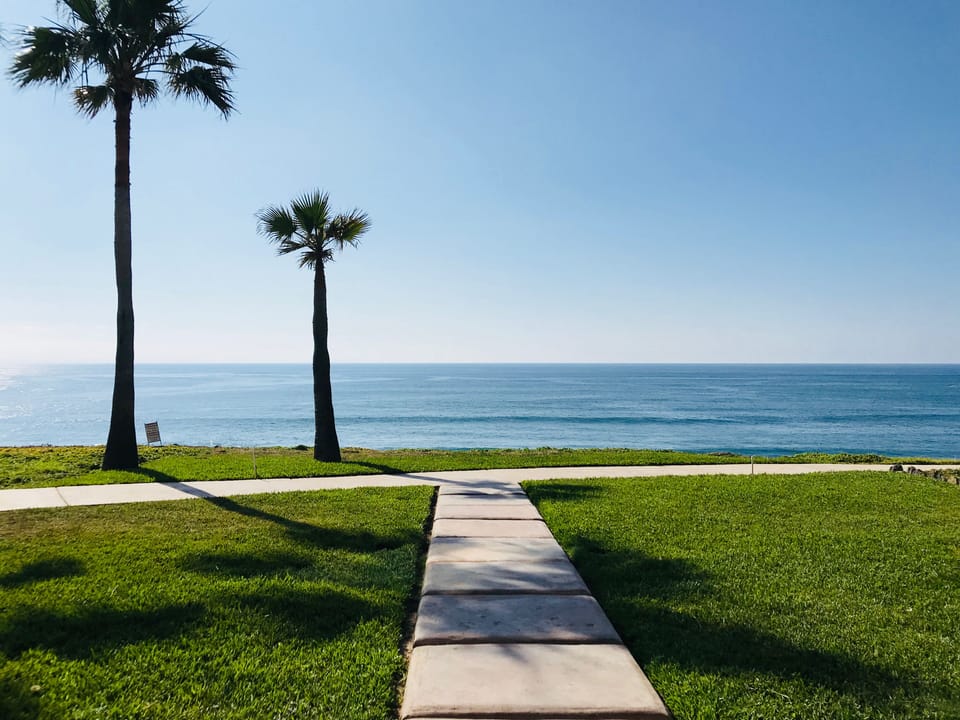 Ocean front location with perfectly manicured yard