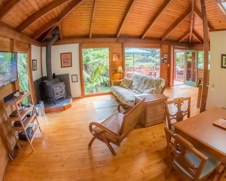 Enjoy the pine wood features and open floorplan with 20ft high vaulted ceilings