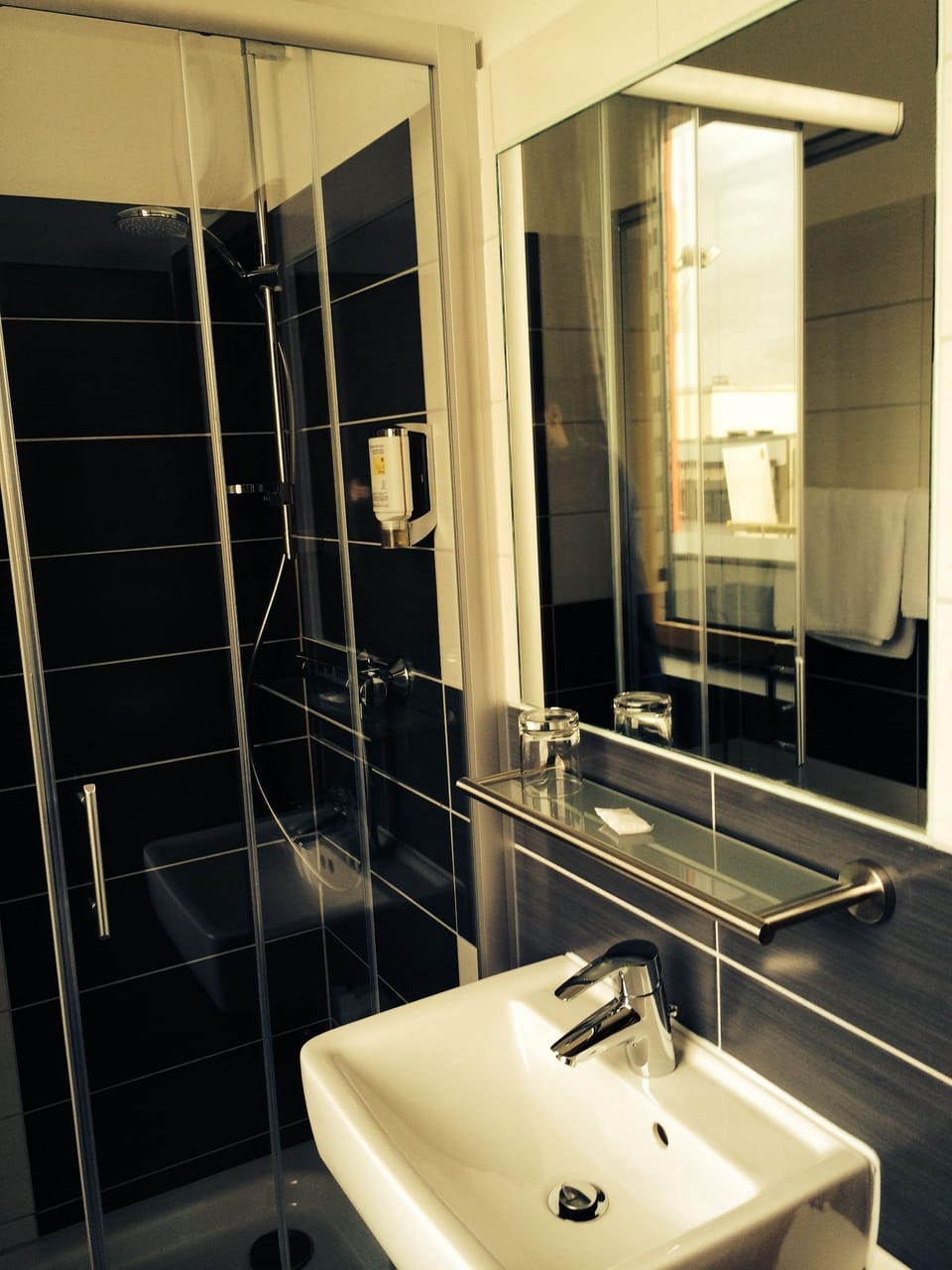 Shower, free toiletries, hair dryer, towels