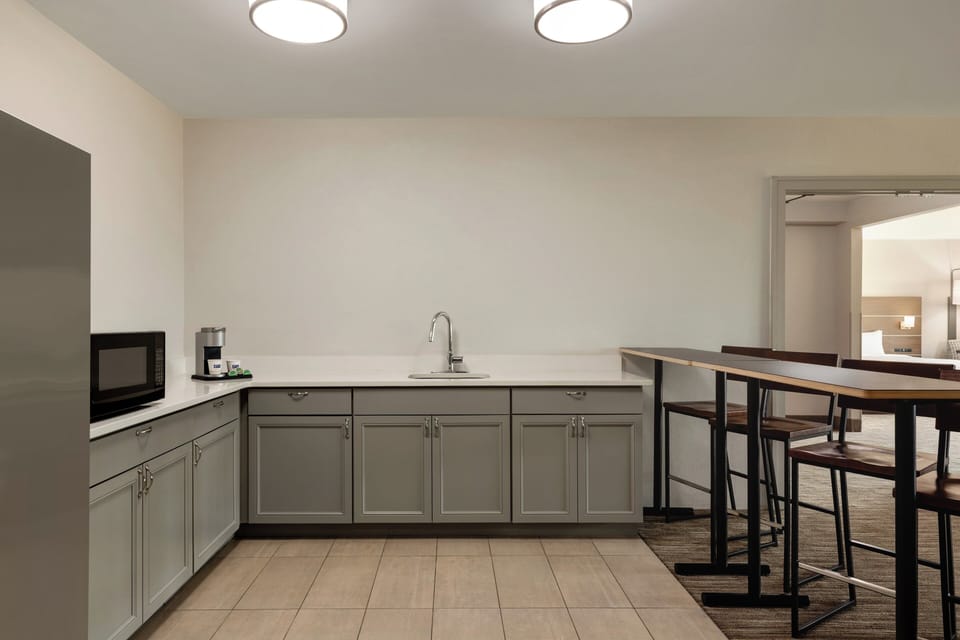 Suite, 1 Bedroom | Desk, iron/ironing board, free WiFi, bed sheets