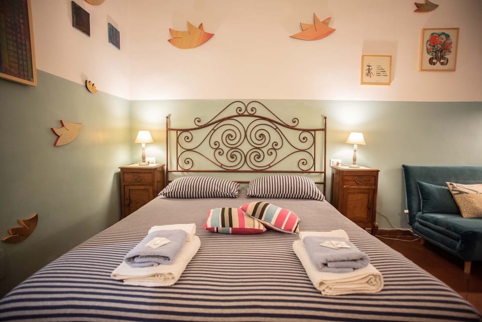 Deluxe Triple Room, Multiple Beds, Private Bathroom | In-room safe, desk, iron/ironing board, free WiFi