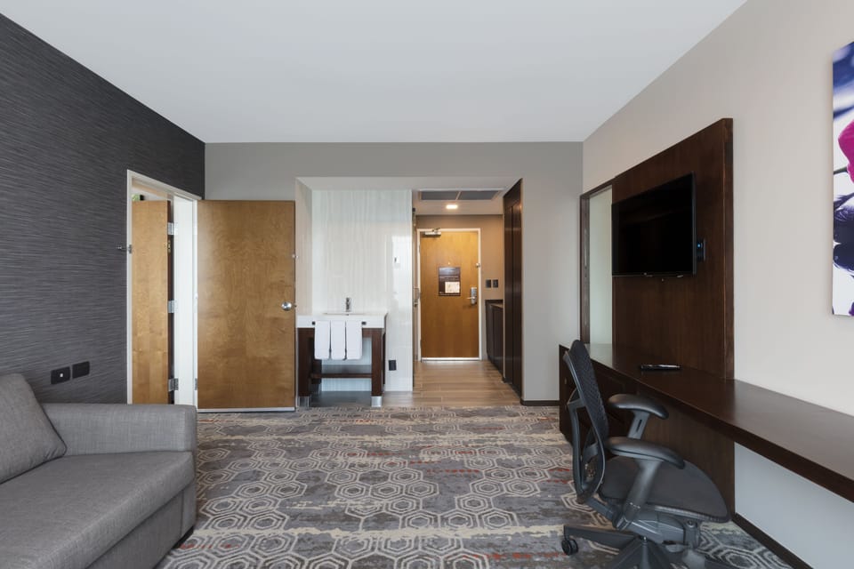 Suite, 1 Bedroom, Non Smoking | Premium bedding, in-room safe, blackout drapes, soundproofing