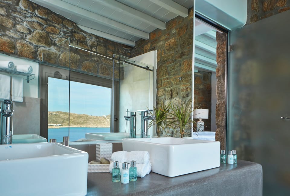 Grand Deluxe Two Bedroom Villa with Private Pool Sea View | Bathroom | Rainfall showerhead, hair dryer, bathrobes, slippers