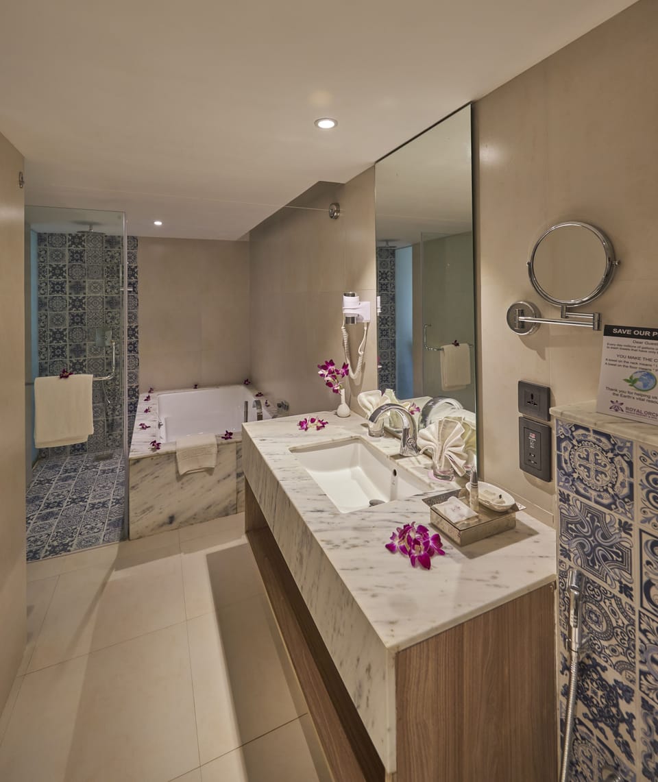 Luxury Suite | Bathroom | Designer toiletries, hair dryer, bathrobes, slippers