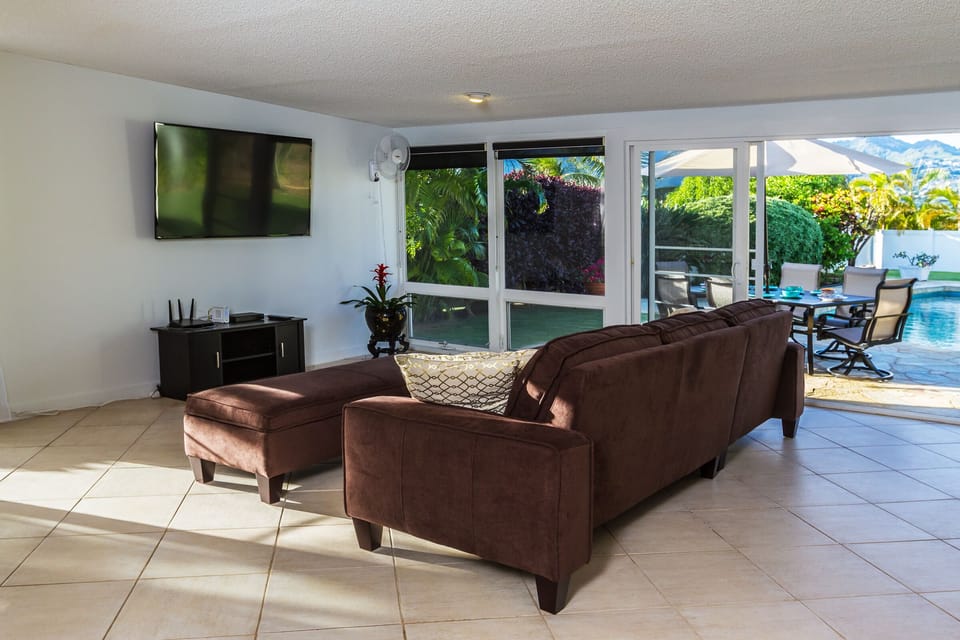 Family room opening into the pool area
