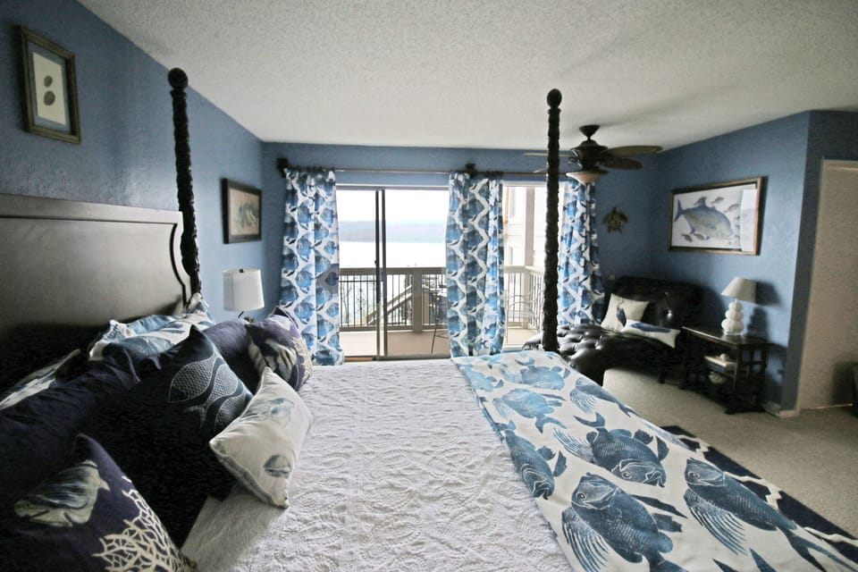 View of deck and lake off blue room