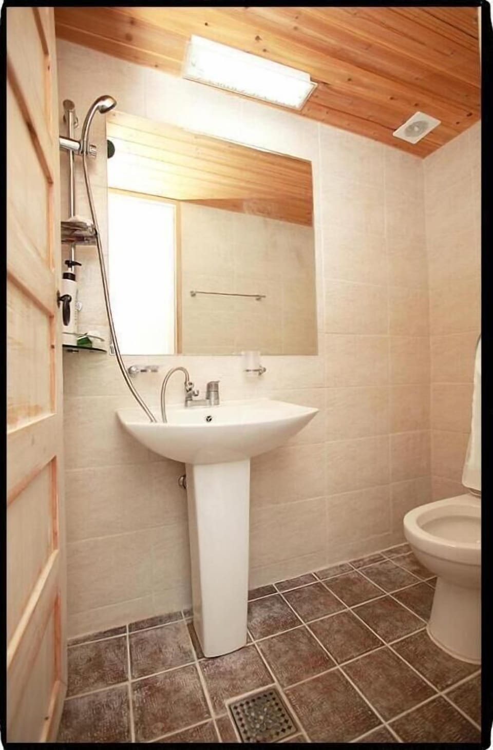 Shower, free toiletries, hair dryer, slippers