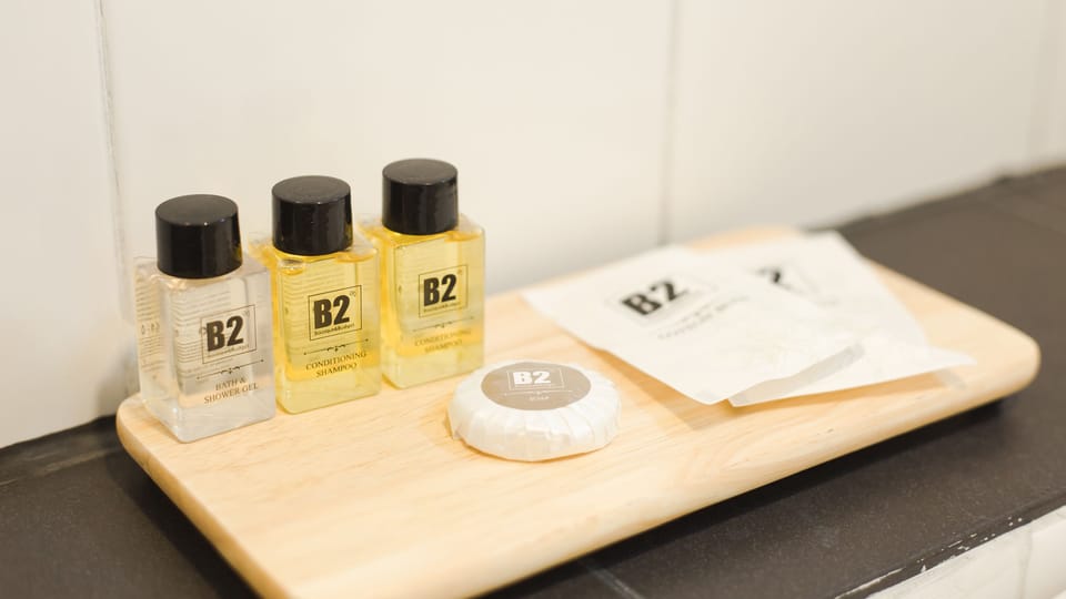 Standard Premier | Bathroom | Shower, rainfall showerhead, towels, soap