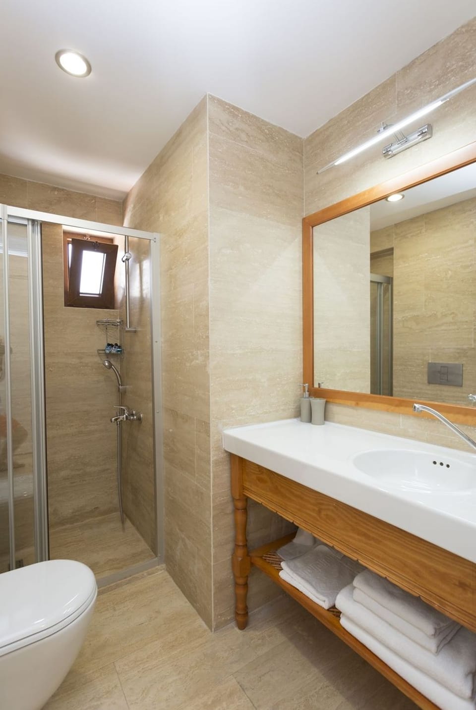 Shower, free toiletries, hair dryer, slippers
