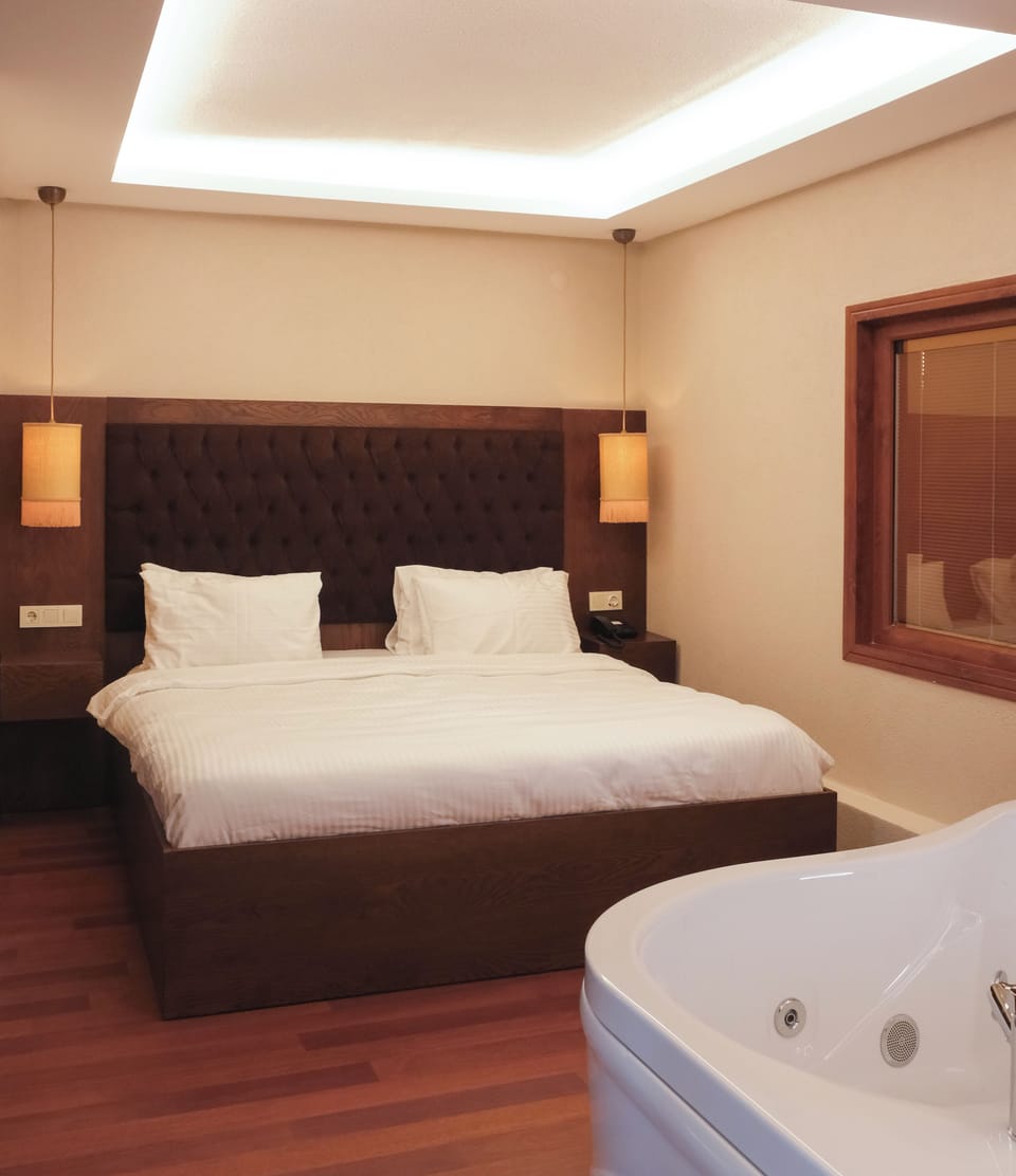 Premium Suite, Terrace, Sea View | Egyptian cotton sheets, premium bedding, minibar, in-room safe