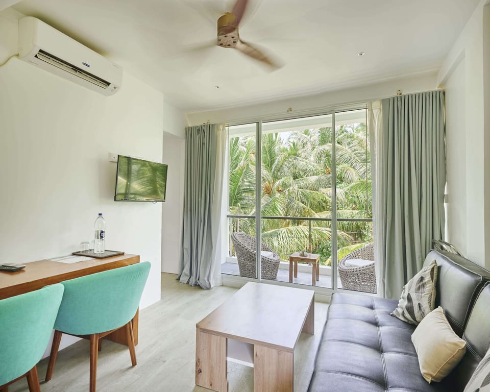 Suite | Living area | Flat-screen TV, first-run movies